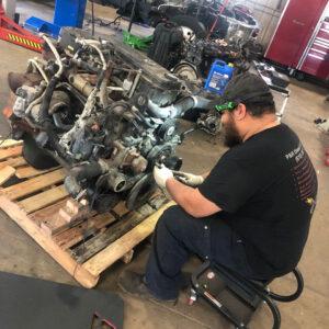 technician fixing motor